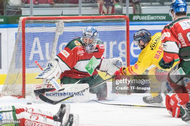 Olivier Roy of Augsburger Panther and Kevin Marshall of Duesseldorfer EG battle for the ball during the DEL match between Augsburger Panther and...