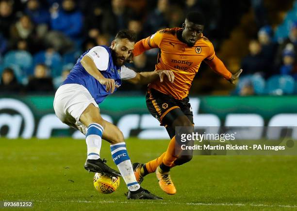 Wolverhampton Wanderers' Alfred N'Diaye and Sheffield Wednesday's Atdhe Nuhiu battle for the ball during the Sky Bet Championship match at...