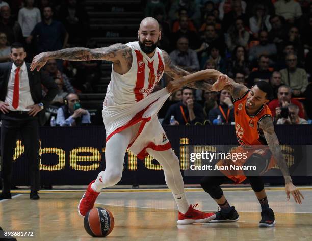 Pero Antic, #12 of Crvena Zvezda mts Belgrade competes with Erick Green, #32 of Valencia Basket during the 2017/2018 Turkish Airlines EuroLeague...