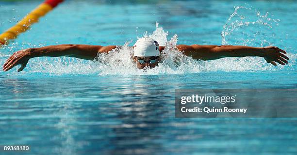 Michael Phelps of the United States competes in the Men's 200m Butterfly Heats during the 13th FINA World Championships at the Stadio del Nuoto on...