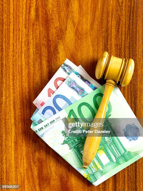 auctioneer's gavel with euro notes. - auction stock pictures, royalty-free photos & images