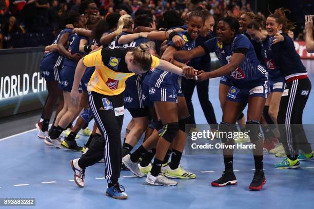 Amandine Leynaud of France celebrate with her team after the IHF Women's Handball World Championship Semi Final match between Sweden and France at...