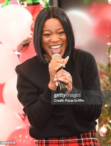 Actress Keke Palmer speaks to students at Radio One, Hot 107.9, and Saving Our Daughters annual Bratz Doll Drive and Giveaway at Barack H. Obama...