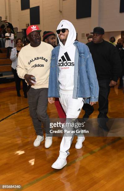 Singer Chris Brown makes a surprise appearance at V-103 Atlanta Winterfest pop-up at Columbia Middle School where he donated $50,000 on December 15,...
