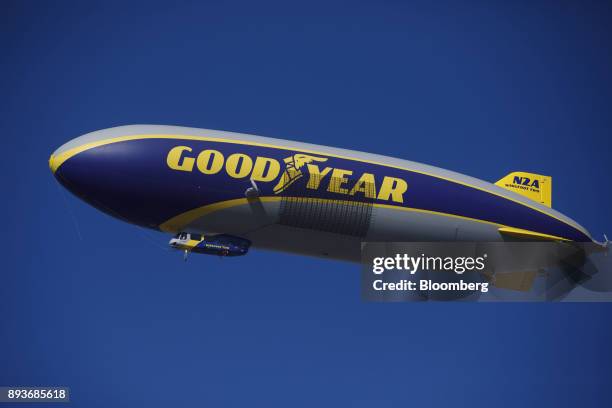 Signage is displayed on the Goodyear Tire & Rubber Co. Wingfoot Two blimp as it arrives at the company's airship base in Carson, California, U.S., on...