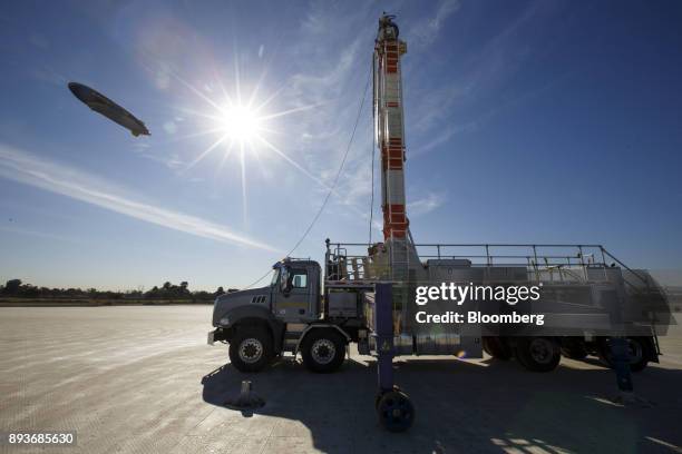 Mast truck stands as the Goodyear Tire & Rubber Co. Wingfoot Two blimp arrives at the company's airship base in Carson, California, U.S., on Friday,...