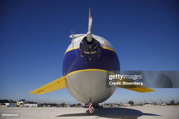 An American flag stands at the tail of the Goodyear Tire & Rubber Co. Wingfoot Two blimp at the company's airship base in Carson, California, U.S.,...