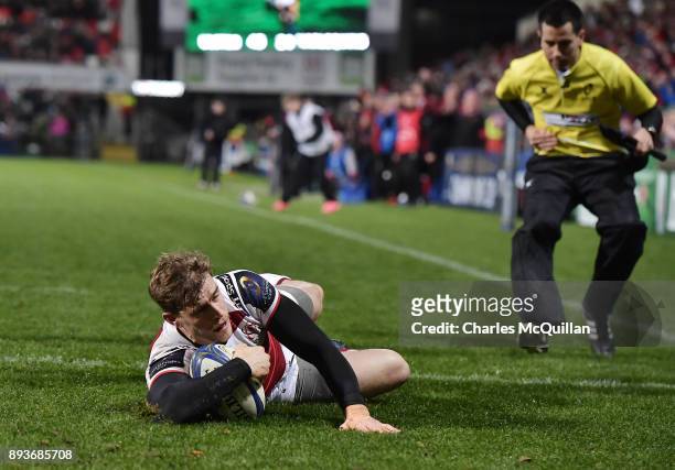 Andrew Trimble of Ulster scores Ulster's sixth try during the European Rugby Champions Cup match between Ulster Rugby and Harlequins at Kingspan...