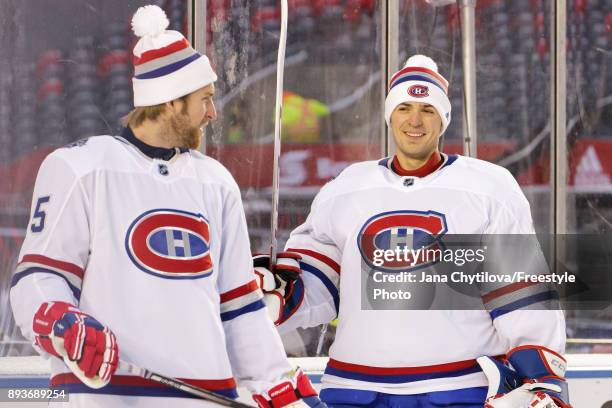 Teammates Joe Morrow and Carey Price of the Montreal Canadiens share a laugh during practice at Lansdowne Park on December 15, 2017 in Ottawa, Canada.