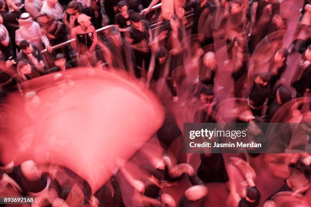 spiritual moving during annual festival in karbala, iraq - bokeh museum stock pictures, royalty-free photos & images