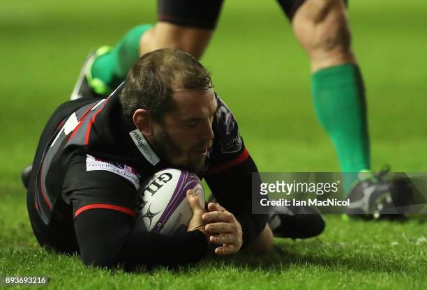 Neil Cochrane of Edinburgh breaks away to score his sides seventh try during the European Rugby Challenge Cup match between Edinburgh and Krasny Yar...