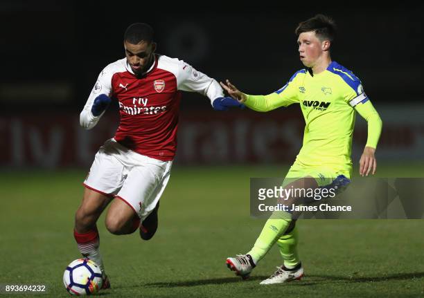 Yassin Fortune of Arsenal attempts to get away from Charles Vernam of Derby during the Premier League 2 match between Arsenal and Derby County at...