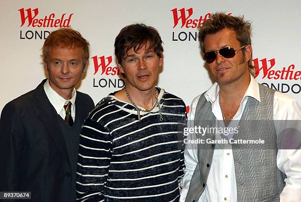 Paul Waaktaar-Savoy, Morten Harket and Magne Furuholmen of the Norwegian pop band A-Ha pose for photographs during a free acoustic show at the...