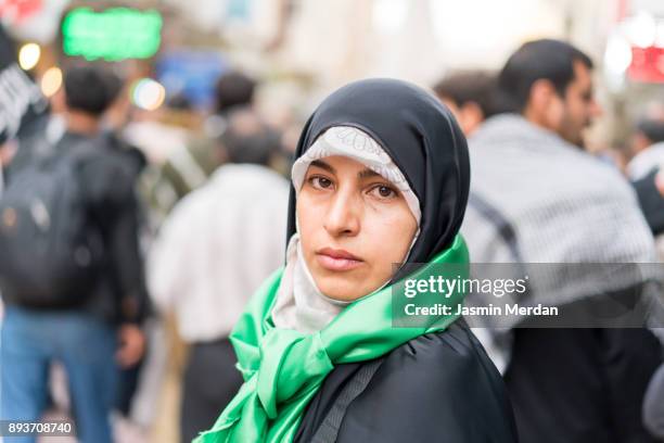 middle eastern woman on the street - shi'ite islam stock pictures, royalty-free photos & images