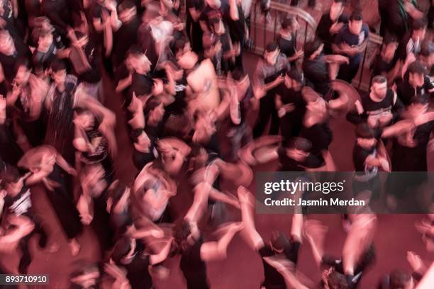 spiritual moving during annual festival in karbala, iraq - bokeh museum stock pictures, royalty-free photos & images