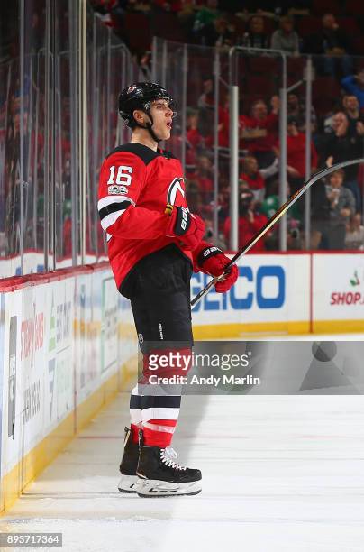 Steven Santini of the New Jersey Devils reacts after scoring a goal against the Dallas Stars during the game at Prudential Center on December 15,...