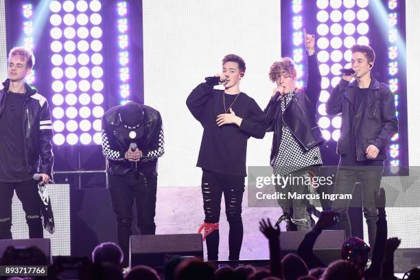 Why Don't We performs onstage during Power 96.1s Jingle Ball 2017 Presented by Capital One at Philips Arena on December 15, 2017 in Atlanta, Georgia.