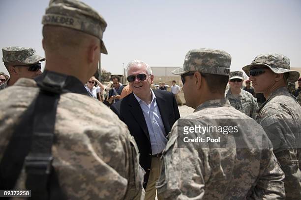 Secretary of Defense Robert Gates speaks with troops from the 4th Brigade, 1st Armored Division's Advise and Assist Mission at COB Adder July 28,...
