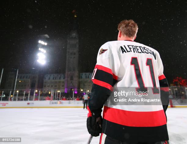 Ottawa Senators alumni Daniel Alfredsson stands for the Canadian national anthem during the 2017 Scotiabank NHL100 Classic Ottawa Senators Alumni...