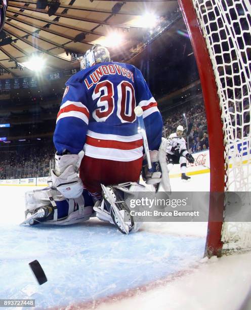 Skating in his 1000th NHL game, Marian Gaborik of the Los Angeles Kings scores a second period goal against Henrik Lundqvist of the New York Rangers...