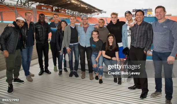 Aric Harding poses with Dwayne De Rosario, Alexi Lalas, Mia Hamm, Steve Nash, Brian McBride, Eddie Johnson, Brian Ching, Chris Wondolowski and Jake...