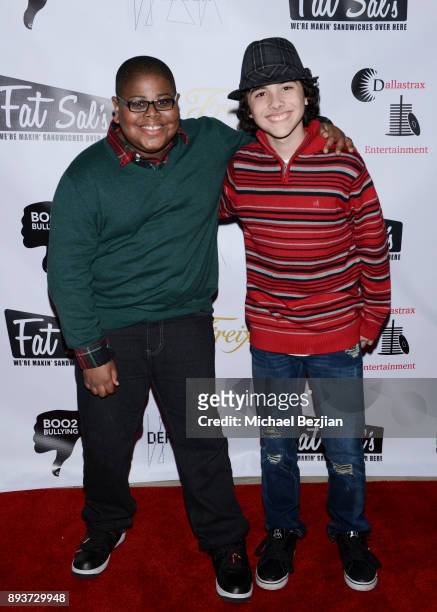 Akinyele Caldwell and Hunter Payton attend The Artists Project & Boo2Bullying Toy Drive to Benefit the Los Angeles Fire Department on December 14,...