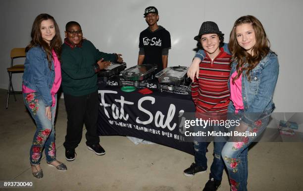 Chiara D'ambrosio, Akinyele Caldwell, Hunter Payton, and Bianca D'ambrosio attend The Artists Project & Boo2Bullying Toy Drive to Benefit the Los...