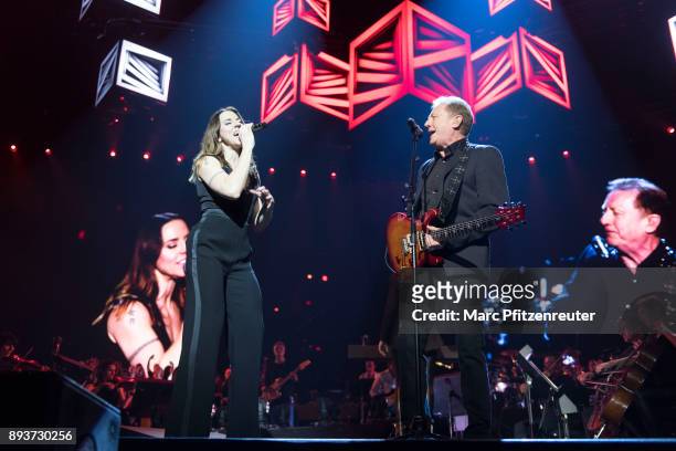 Melanie C and John Miles perform onstage during the Night of The Proms at the Lanxess Arena on December 15, 2017 in Cologne, Germany.