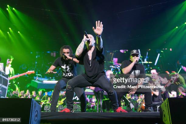 Johnny, Mateo and Don Cali of Culcha Candela perform onstage during the Night of The Proms at the Lanxess Arena on December 15, 2017 in Cologne,...