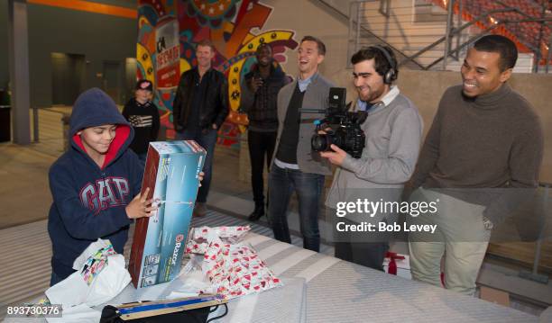 Alexi Lalas, Eddie Johnson, Stu Holden and Charlie Davis look on during the Kick in for Houston participants and Leesa Sleep surprise familes...