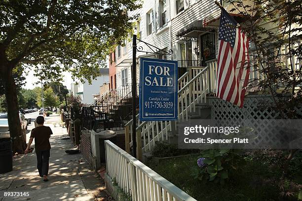 Home stands for sale on July 28, 2009 in the Brooklyn borough of New York City. The Commerce Department announced July 27, that new-home sales surged...