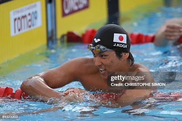 Japan's Koga Junya celebrates after winning gold and beating a Championships record during the men's 100m backstroke final on July 28, 2009 at the...