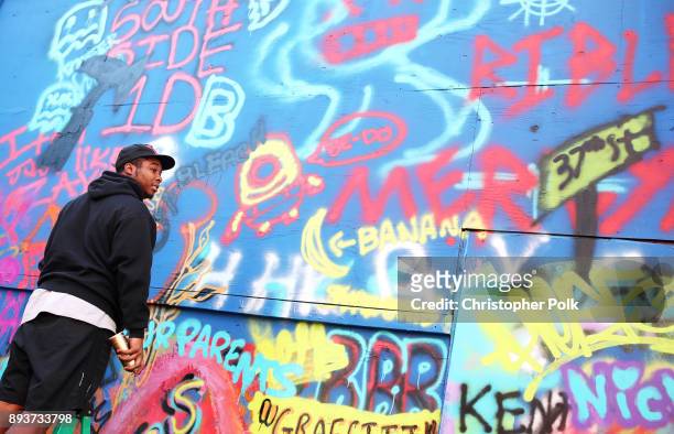 Members of the band BROCKHAMPTON painte a mural during BROCKHAMPTON and Spotify host an event for their biggest fans to celebrate the launch of their...