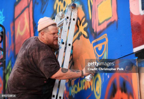 Members of the band BROCKHAMPTON painte a mural during BROCKHAMPTON and Spotify host an event for their biggest fans to celebrate the launch of their...