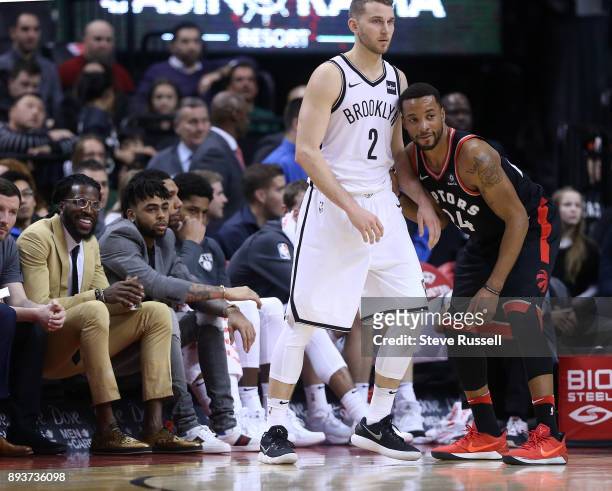 Toronto Raptors forward Norman Powell defends against Brooklyn Nets guard Nik Stauskas as DeMarre Carroll watches as the Toronto Raptors beat the...