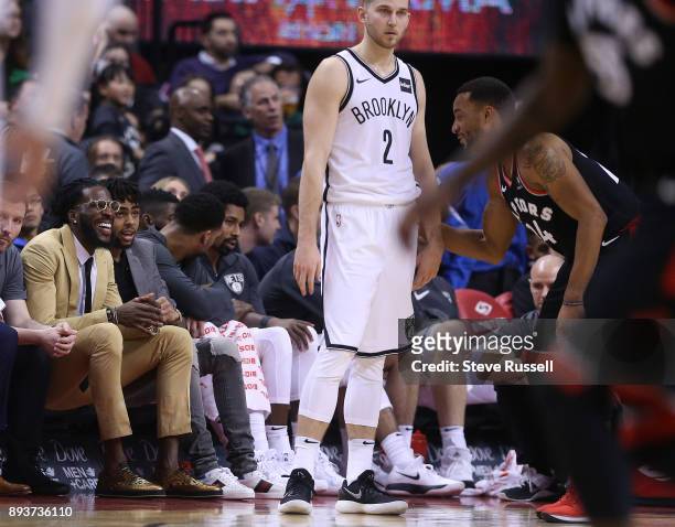 Brooklyn Nets forward DeMarre Carroll jokes with Toronto Raptors forward Norman Powell as the Toronto Raptors beat the Brooklyn Nets at the Air...