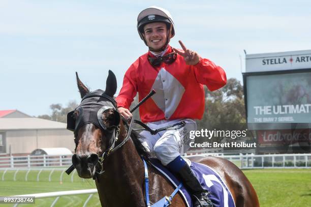 Chris Caserta returns to the mounting yard on Angelucci after winning the Sheamus Mills Bloodstock Handicap at Caulfield Racecourse on December 16,...