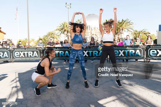 Lissa Bankston, Nina Dobrev and Renee Bargh work out together at "Extra" at Universal Studios Hollywood on December 15, 2017 in Universal City,...