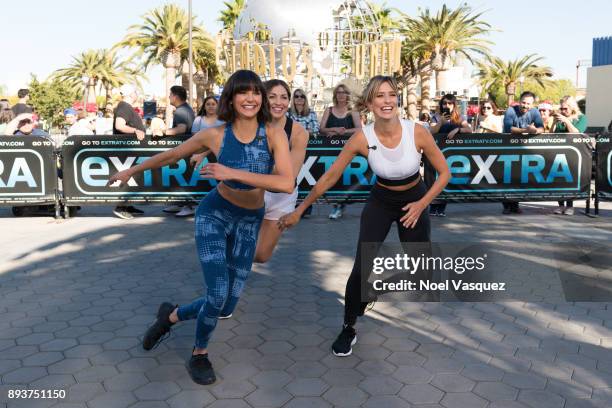 Nina Dobrev and Renee Bargh work out together at "Extra" at Universal Studios Hollywood on December 15, 2017 in Universal City, California.