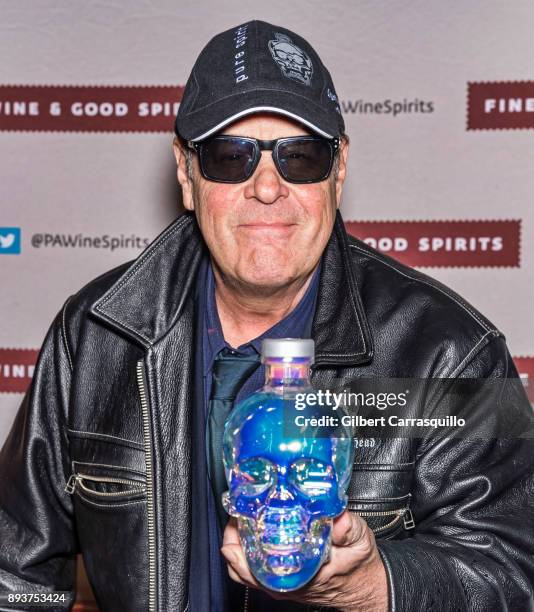 Actor Dan Aykroyd signs bottles of Crystal Head Vodka at Philadelphia Fine Wine & Good Spirits Store on December 15, 2017 in Philadelphia,...