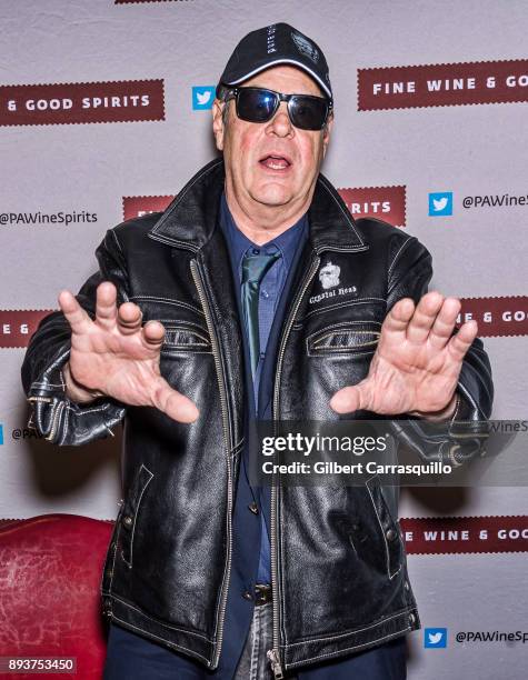 Actor Dan Aykroyd signs bottles of Crystal Head Vodka at Philadelphia Fine Wine & Good Spirits Store on December 15, 2017 in Philadelphia,...