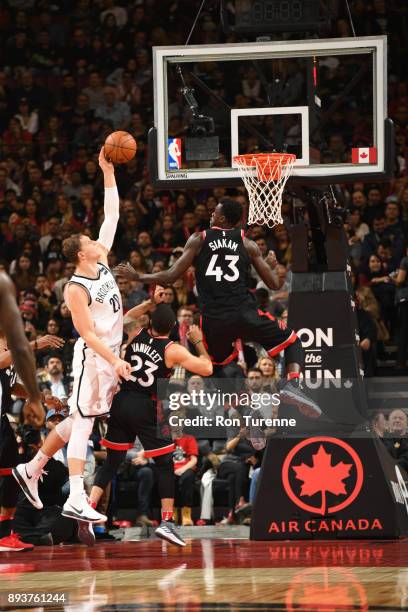 Timofey Mozgov of the Brooklyn Nets dunks against the Brooklyn Nets on December 15, 2017 at the Air Canada Centre in Toronto, Ontario, Canada. NOTE...