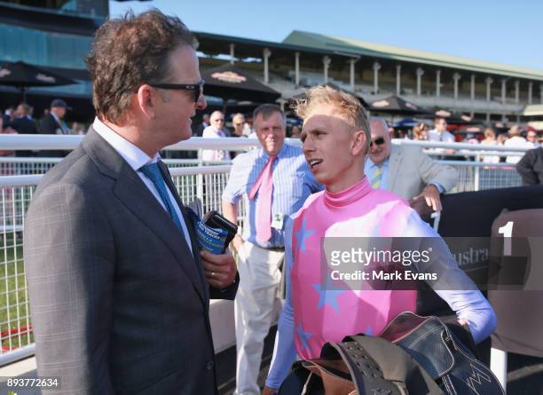 Jean Van Overmeire talks to Mark Waugh, husband of Trainer Kim Waugh, after winning race 9 during Sydney Racing at Royal Randwick Racecourse on...