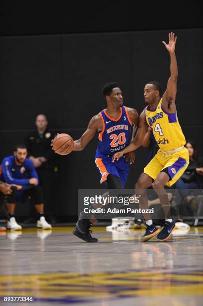 Nigel Hayes of the Westchester Knicks handles the ball against V.J. Beachem of the South Bay Lakers during an NBA G-League game on December 15, 2017...