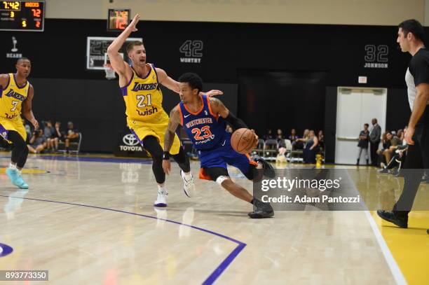 Trey Burke of the Westchester Knicks handles the ball against Travis Wear of the South Bay Lakers during an NBA G-League game on December 15, 2017 at...