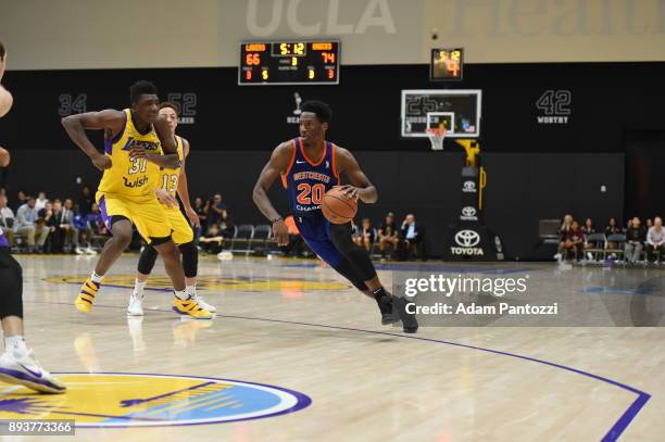 Nigel Hayes of the Westchester Knicks drives to the basket against the South Bay Lakers during an NBA G-League game on December 15, 2017 at UCLA...