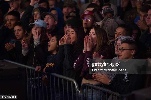 Attendees watch a musical performance during Base*FEST Powered by USAA on December 15, 2017 at Naval Air Station Pensacola, Florida.