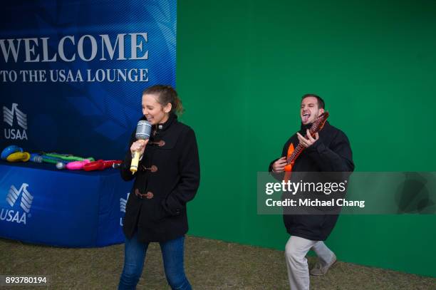 Attendees have a photo taken during Base*FEST Powered by USAA on December 15, 2017 at Naval Air Station Pensacola, Florida.