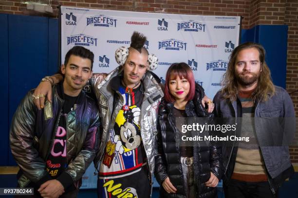 Joe Jonas, Cory Whittle, JinJoo Lee and Jack Lawless during Base*FEST Powered by USAA on December 15, 2017 at Naval Air Station Pensacola, Florida.
