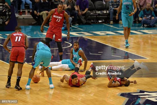 Players on the floor during the NBA match between Miami Heat vs Charlotte Hornets at the Spectrum arena in Charlotte, NC, United States on December...